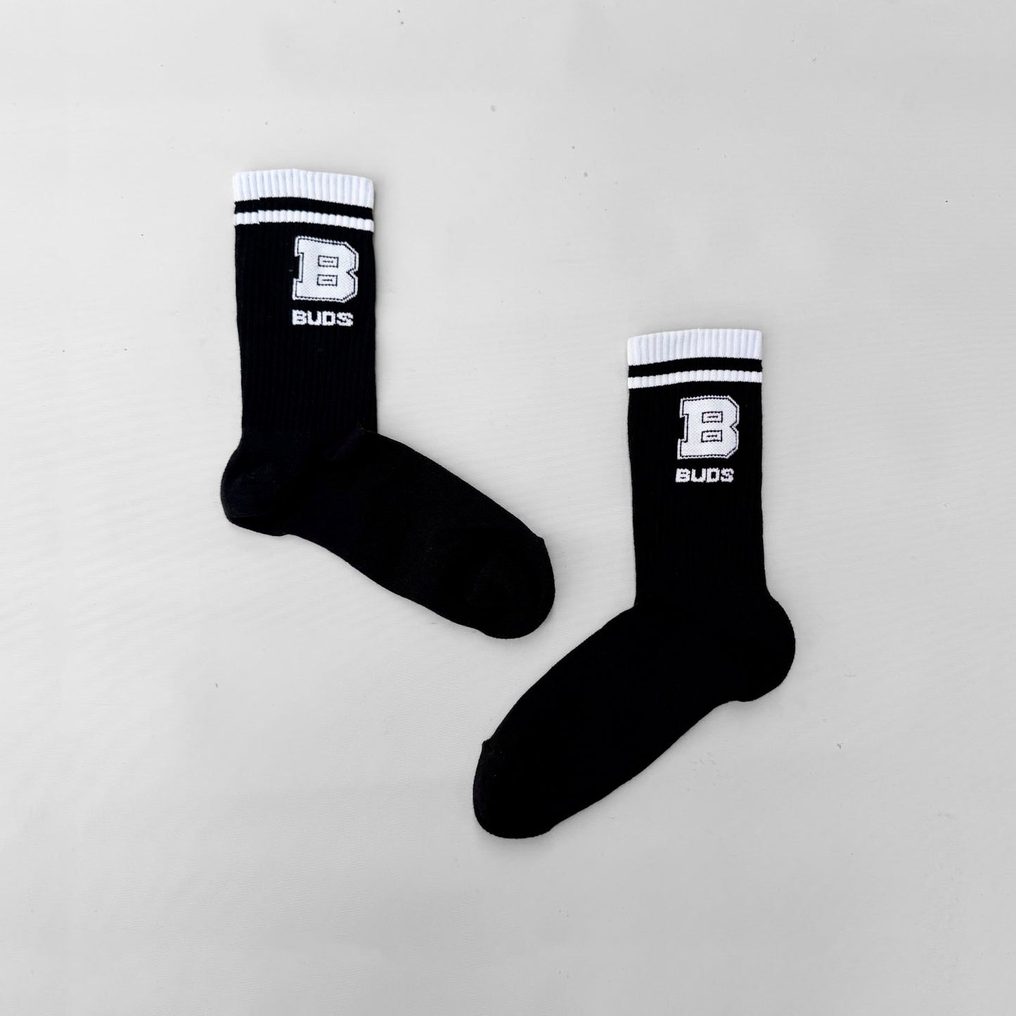 Medias Canilleras Negras Líneas B Buds