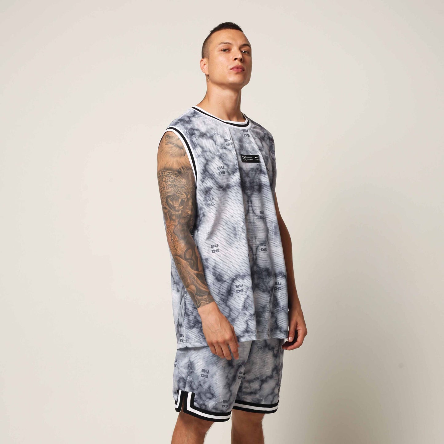 Camisilla Malla Sublimada Mármol Buds